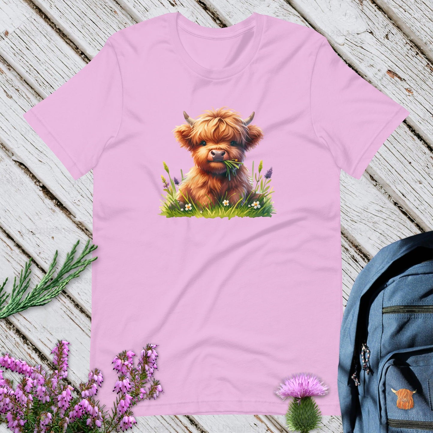 A Highland Cow In The Grass Unisex T-Shirt