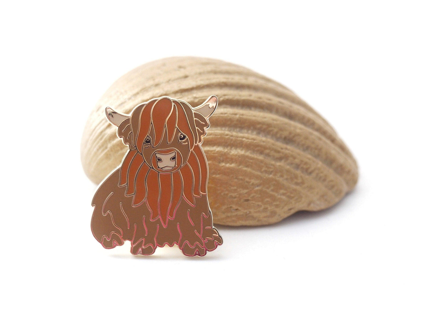 Cute Highland Cow Enamel Pin in a Sitting Position