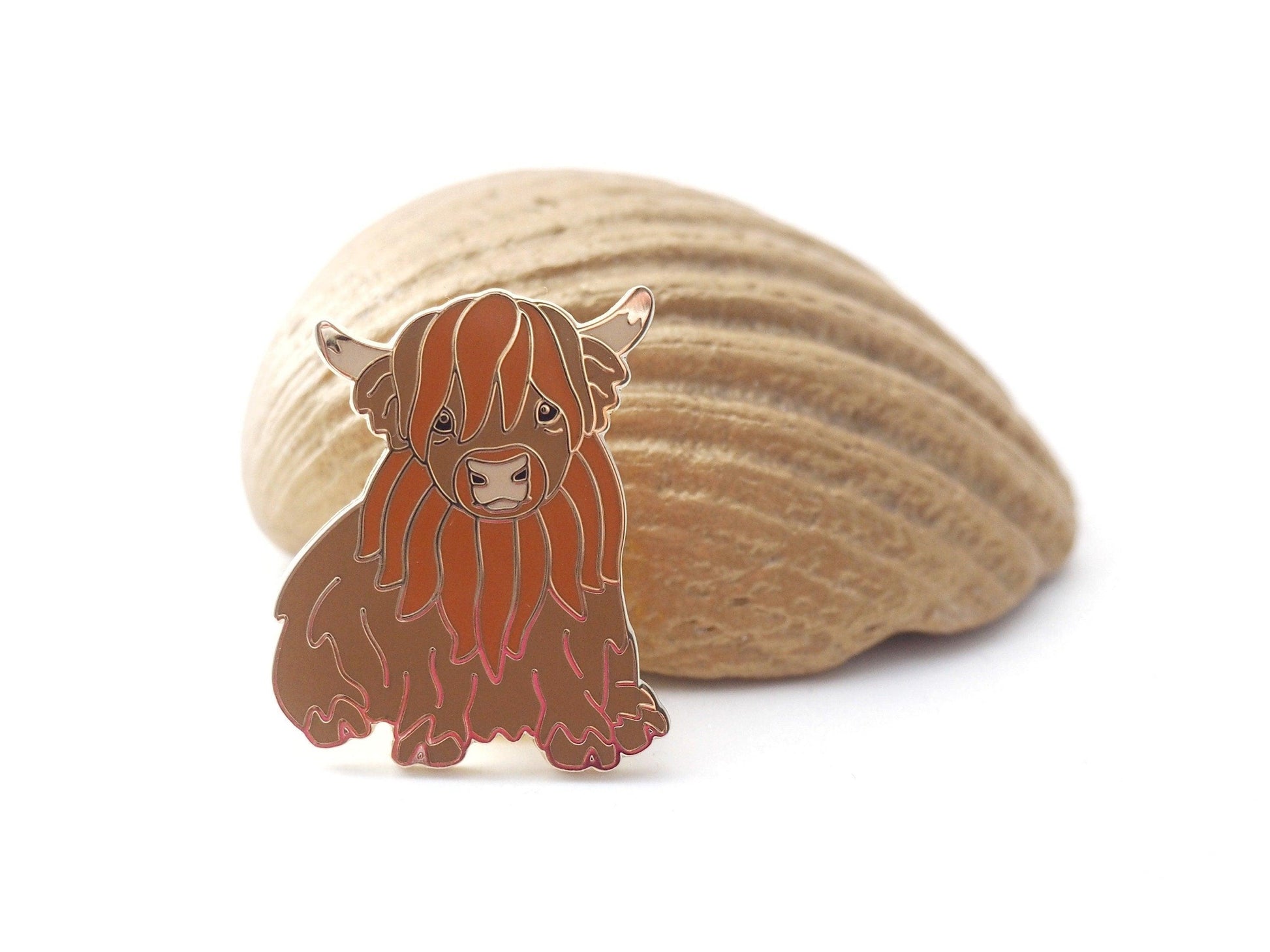Cute Highland Cow Enamel Pin in a Sitting Position