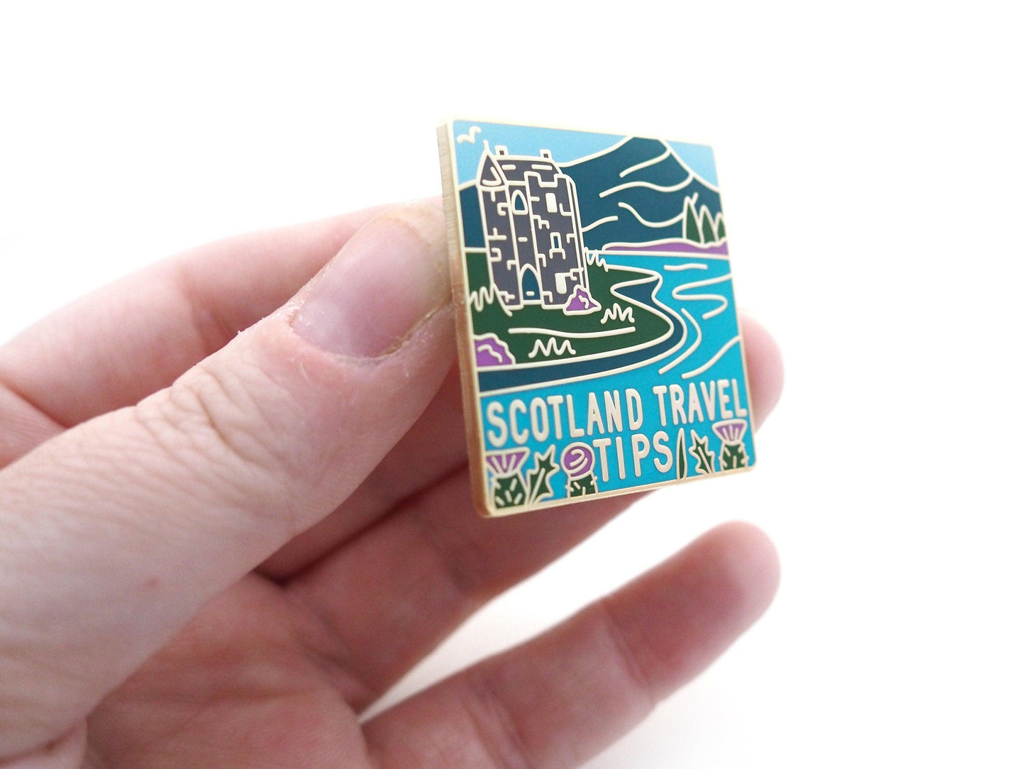 Scotland Travel Tips enamel pin.