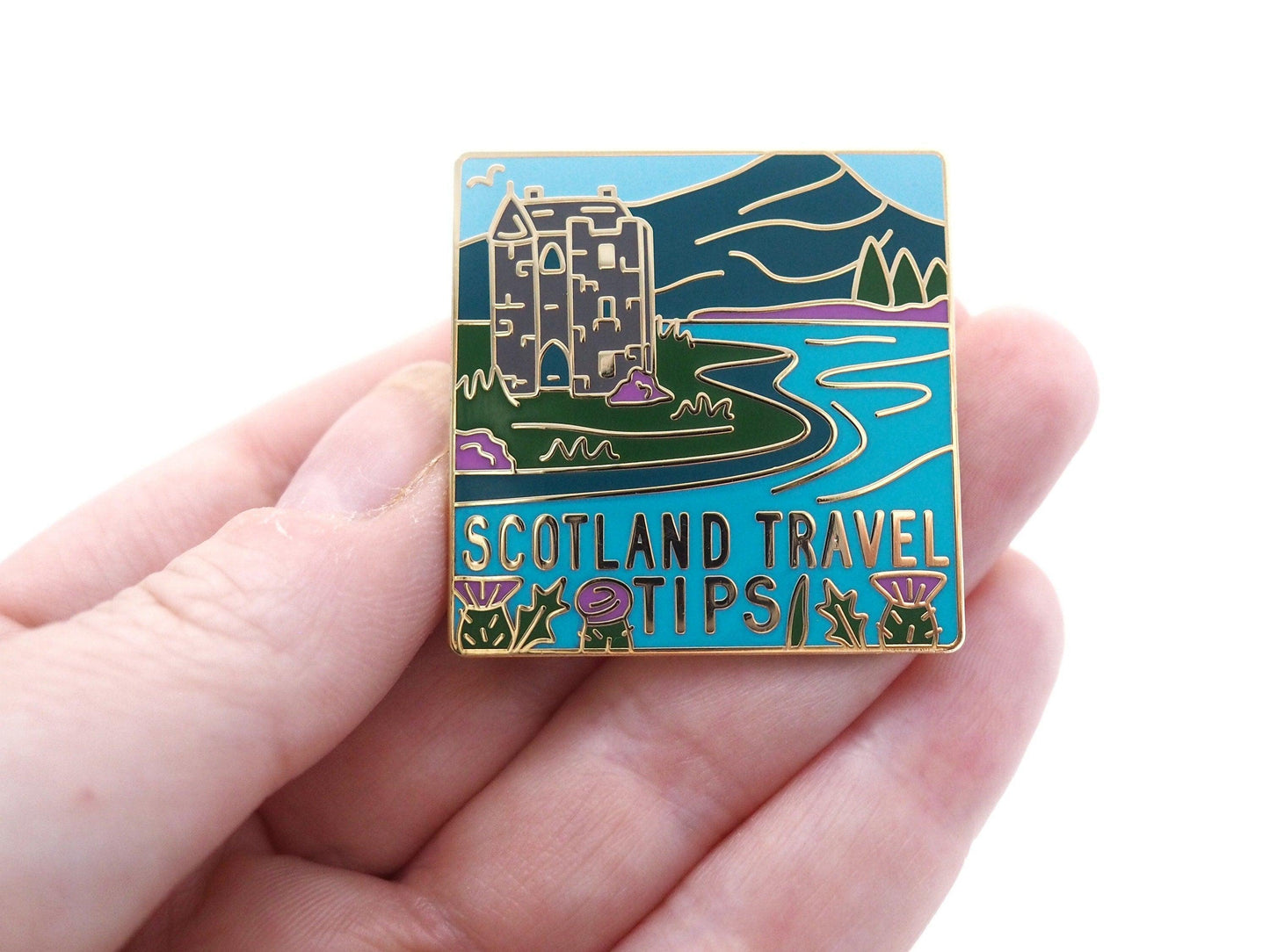 Scotland Travel Tips enamel pin.