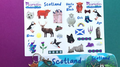 Scotland Bundle Video featuring enamel pin and keychain, postcard, sticker sheets and vinyl stickers